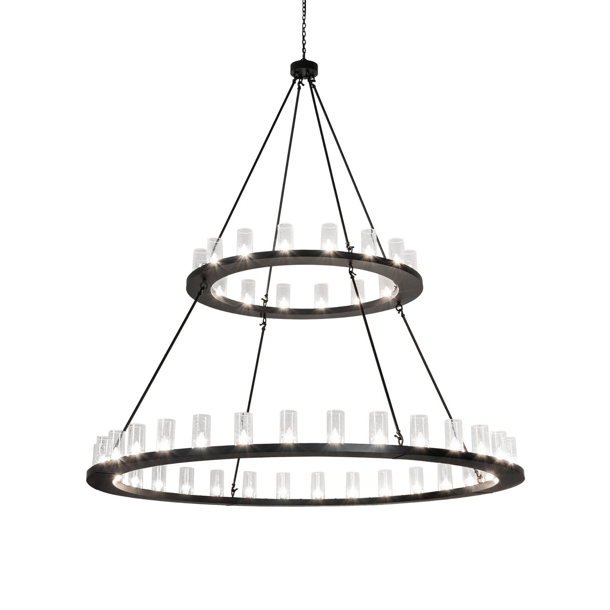 Lit view of two tier chandelier with seeded glass cylinders.