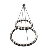 Top angle view of two tier chandelier suspension and circular rings.