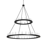 Unlit view of two tier chandelier with seeded glass cylinders.