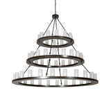 Three-tier Loxley chandelier unlit view with cylindrical frosted glass lights and bronze rings.