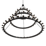 Lower angle lit view emphasizing the bottom ring and glowing candle lights.