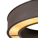 Close-up detail of travertine Idalight diffuser with warm marbled texture and metal trim.