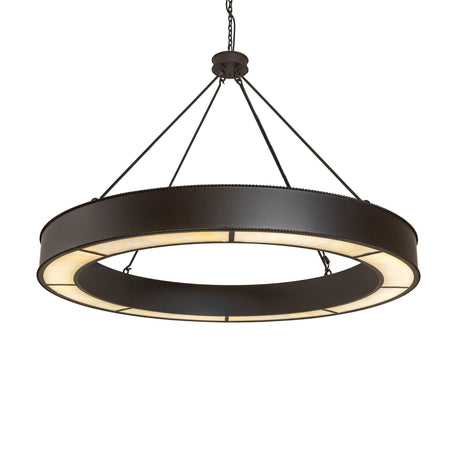 Lit view of circular chandelier with beige art glass diffuser and bronze finish.