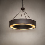 Escabroso chandelier ambient view showing warm illumination and circular travertine diffuser.