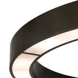 Close-up detail of illuminated Whitestone Idalight diffuser and curved bronze frame.
