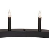 Close-up of faux candle bulbs mounted on chandelier ring.
