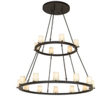 Lit view of two tier 18 light chandelier with antique white cylinders and bronze rings.