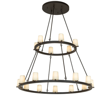 Lit view of two tier 18 light chandelier with antique white cylinders and bronze rings.