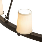 Close up of antique white textrene cylindre shade on Loxley chandelier.