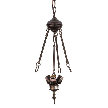 Detailed view of pendant hardware frame with chain suspension.