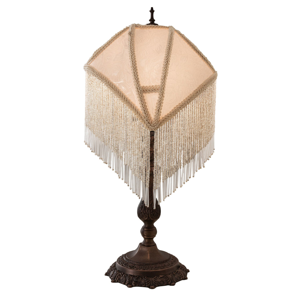 Back view of ivory shade lamp with detailed bronze base and beaded fringe.