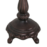 bottom view of mahogany bronze table base with sturdy construction.