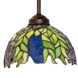 Front view of the Tiffany Honey Locust Pendant showcasing spring green leaves.