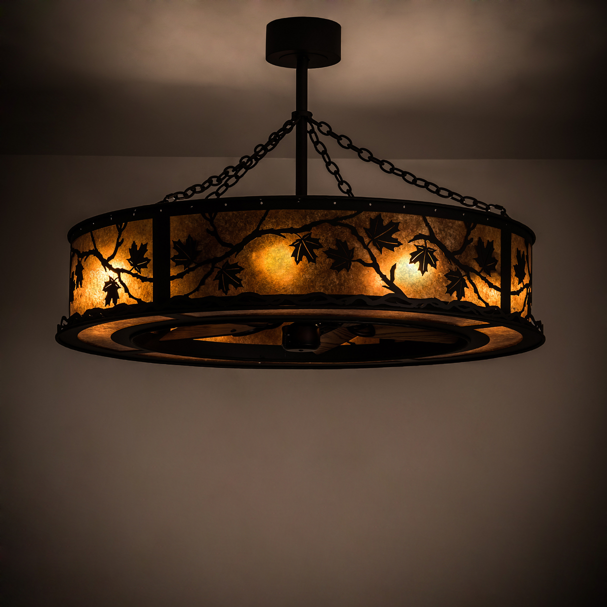 Maple Leaf Chandel-Air illuminating room with warm amber light and leaf design.