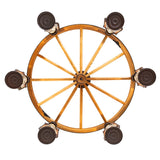 Bottom view of wooden wagon wheel chandelier with lantern layout.