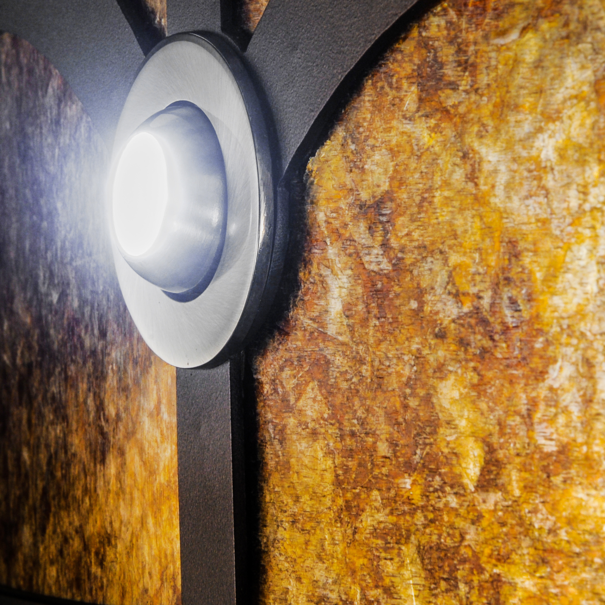 Closeup showing glowing Amber Mica diffuser and frame details.