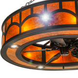 Closeup of light fixture detail with brushed metal trim and glow.