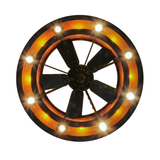 Bottom view of the fan surrounded by bright downlights.