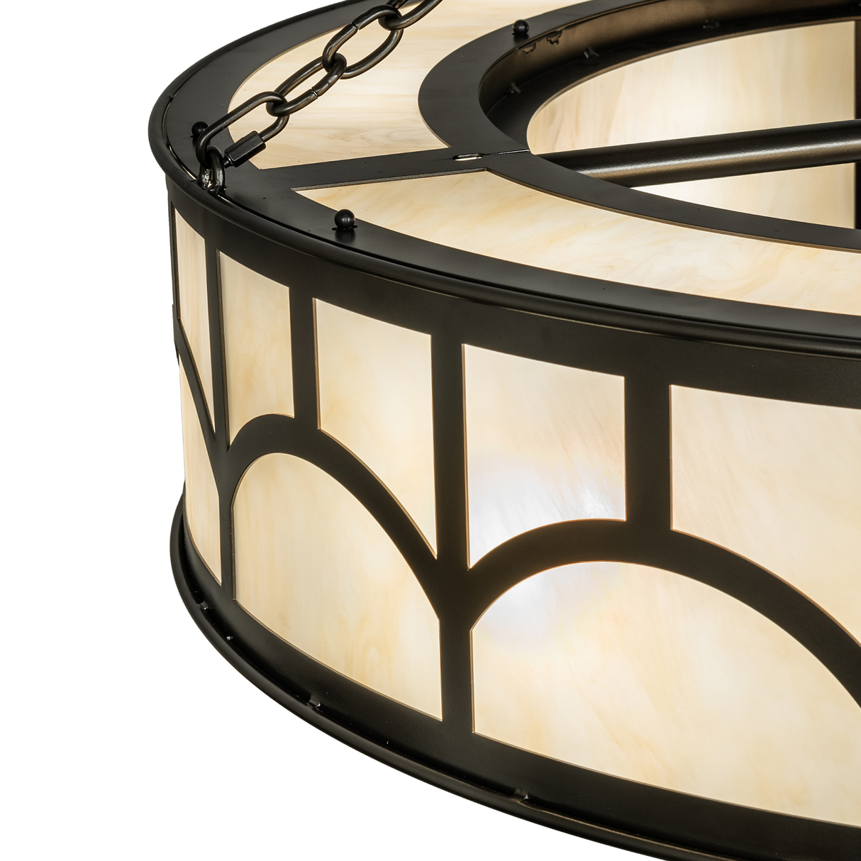 Close-up of arched diffuser pattern and metal framework.