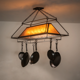Mission Prime chandelier with amber mica shade lit in kitchen.