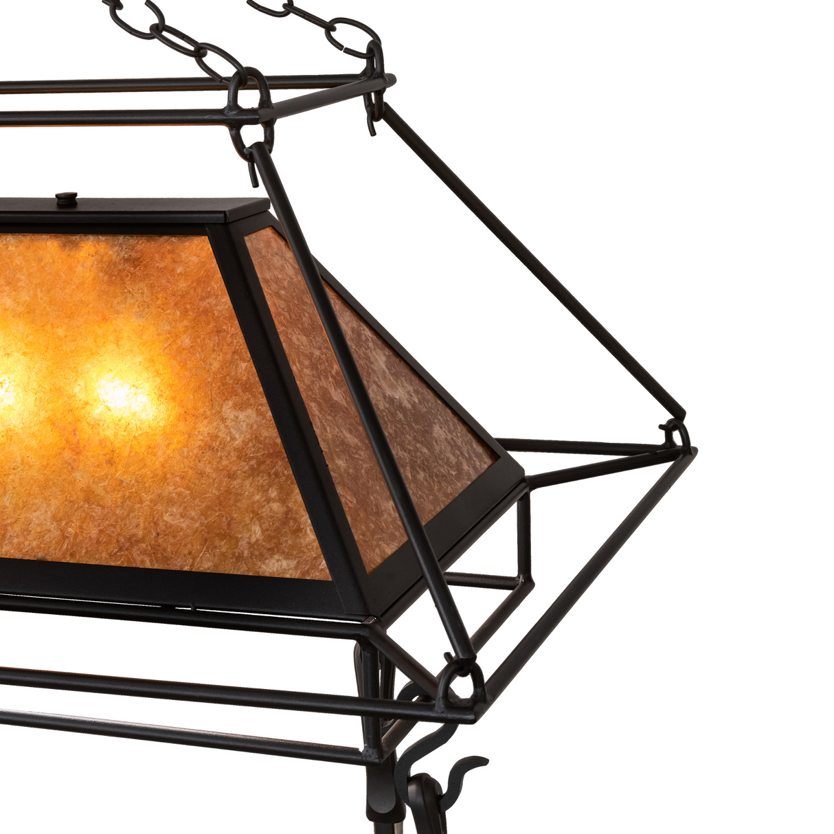 Detailed view of Mission Prime chandelier mica shade lit.