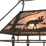 Closeup of moose silhouette and warm mica glow.