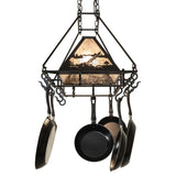 End view of rustic moose chandelier glowing light.