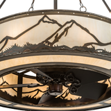 Close-up of mountain silhouette detail on illuminated shade.