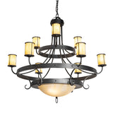 Nehring 9 light chandelier illuminated with Botticino Idalight shades and wrought iron frame.