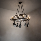 15 Light Pot Rack chandelier illuminated in kitchen setting.