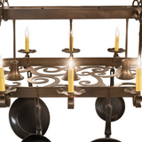 Closeup of faux candlelight and scroll accent on Neo 15 chandelier.