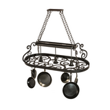 Angled view highlighting scrollwork and pan hooks on pot rack.