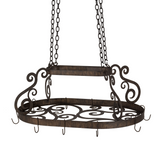Angled view showing oval shape and scrollwork pattern