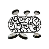 Bottom view showing decorative scroll pattern and hanging chains.