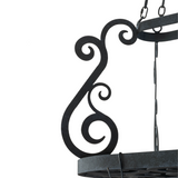 Close-up of hand-forged scroll accent on Neo pot rack.