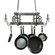 Side perspective of Neo chandelier with scroll details lit.