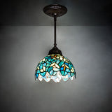 Nightfall Wisteria Mini Pendant glowing in ambient light with colorful glass design.