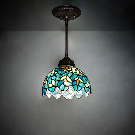 Nightfall Wisteria Mini Pendant glowing in ambient light with colorful glass design.