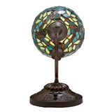 Back view of Nightfall Wisteria sconce base with detailed metal floral carvings.