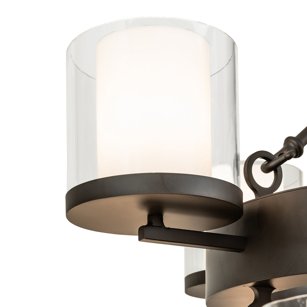 Close-up view of cylindrical glass shade with inner diffuser.