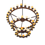 Bottom angle view of ring chandelier emphasizing layered rings and glass cylinders.