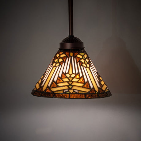 Illuminated Nuevo Mission mini pendant with warm amber and mahogany bronze tones.