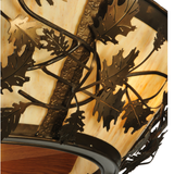 Close-up of oak leaf metal accents on amber diffuser.