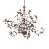 Bottom angle of chandelier revealing dense oak leaf arrangement and central hub.