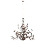 Full view of chandelier with sculpted oak leaves and branching metal arms.