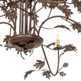 Close-up of the upper stem showing wrapped oak leaf accents.