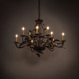 Oak leaf 9 light chandelier in ambient lighting with soft candle glow.