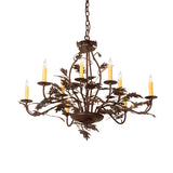 Lit view of the oak leaf 9 light chandelier glowing warmly.