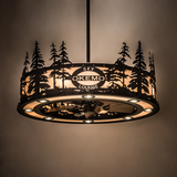 Illuminated Okemo Sky Lounge Chandel-Air glowing warmly in a dark room with pine silhouette design.
