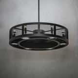Unlit Paloma Golpe chandelier fan in ambient room setting.
